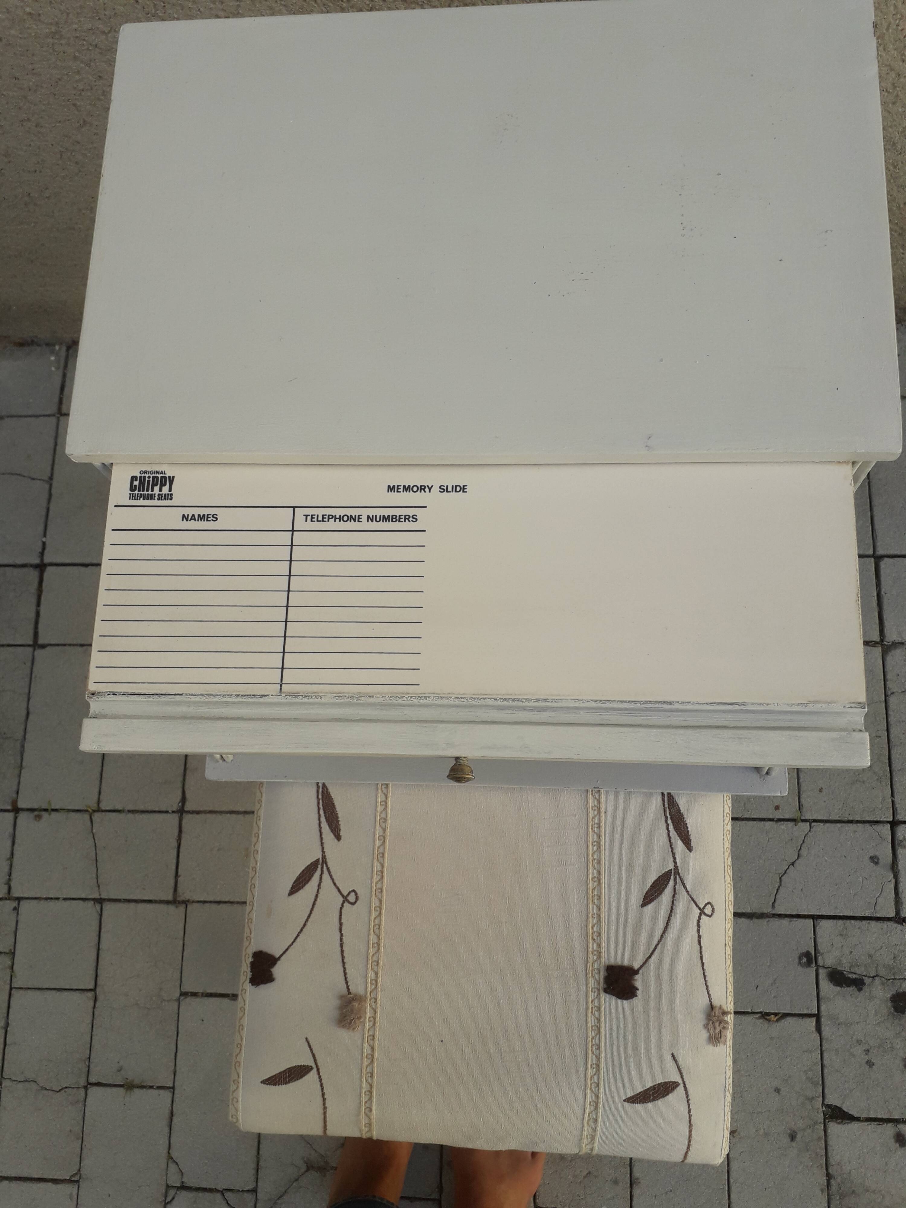 Telephone furniture with its built-in stool and tablet for such