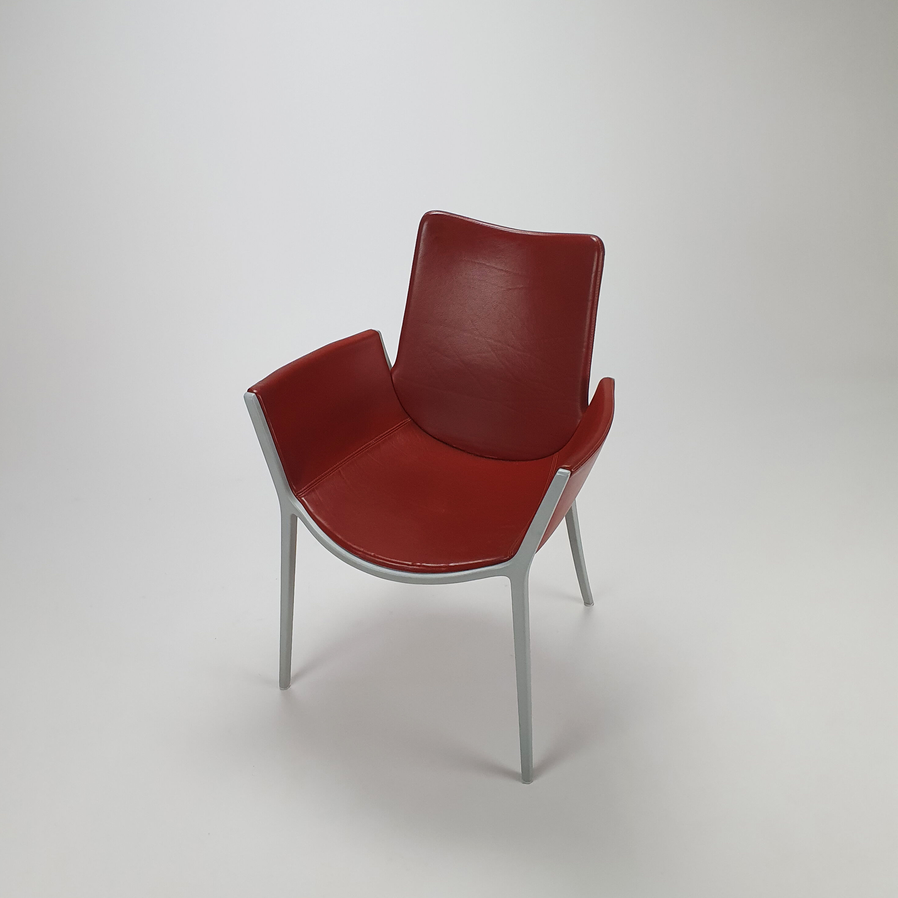Set of 4 red leather and aluminium duna chairs by Jorge Pensi for Cassina, 1990s