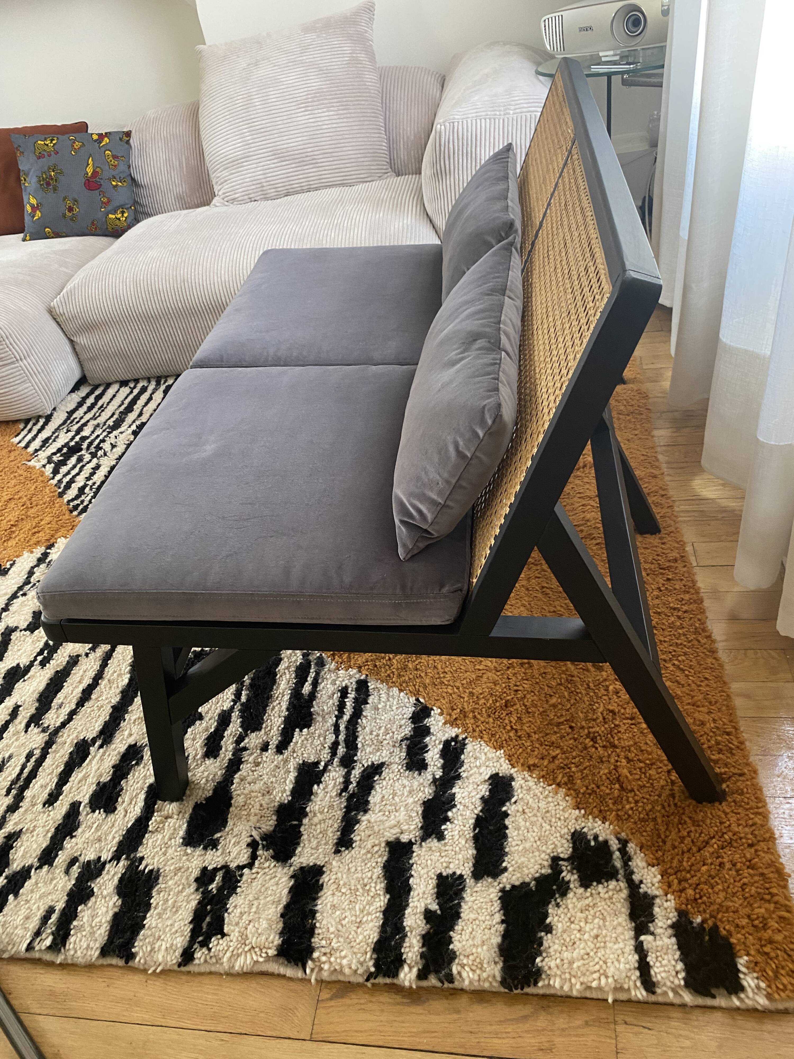 Black lacquered oak 2-seater bench with caning and lalala velvet.