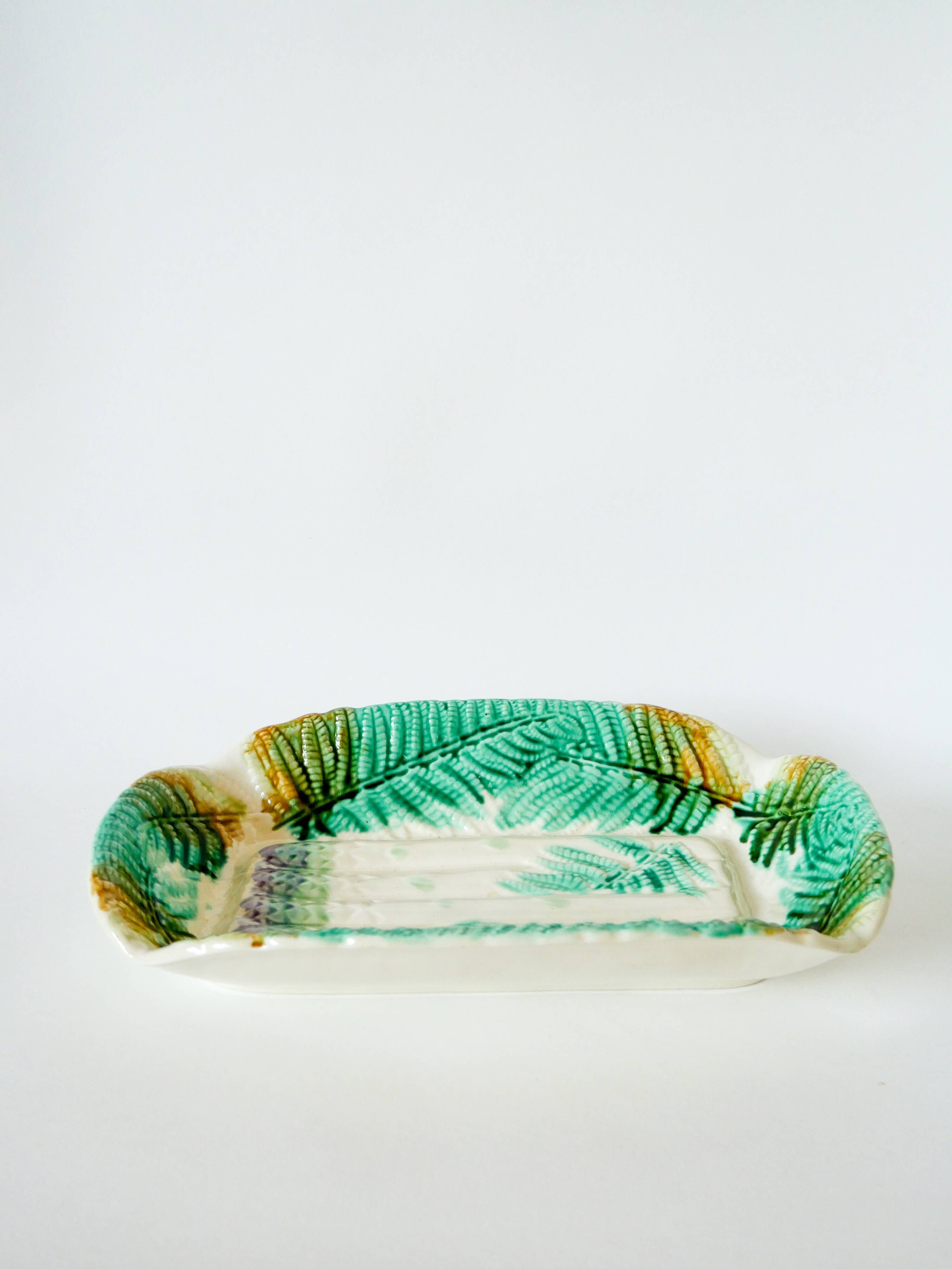 Large asparagus dish in Salins slip, early 20th century