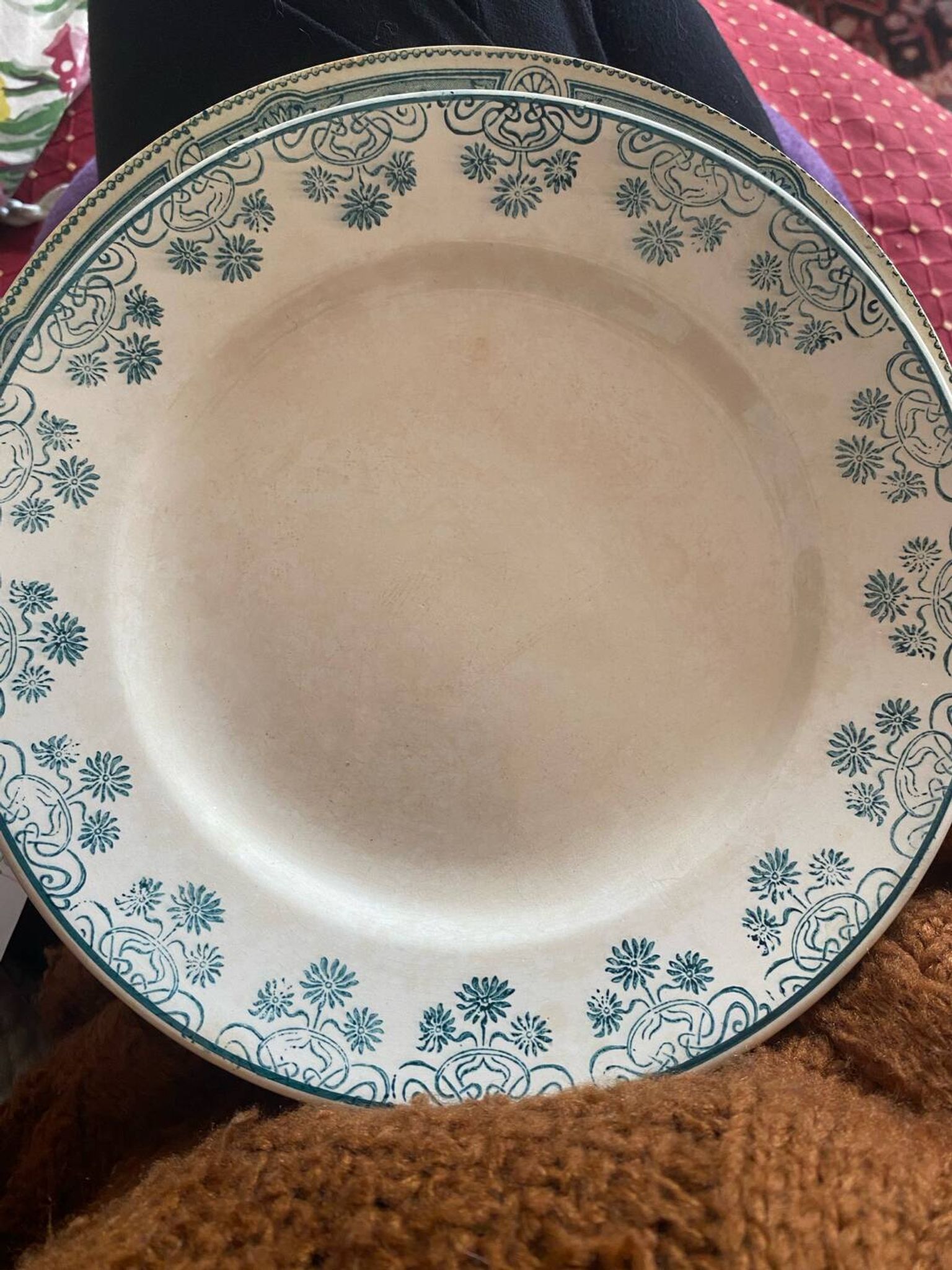 3 flat plates in ironstone with a green floral border