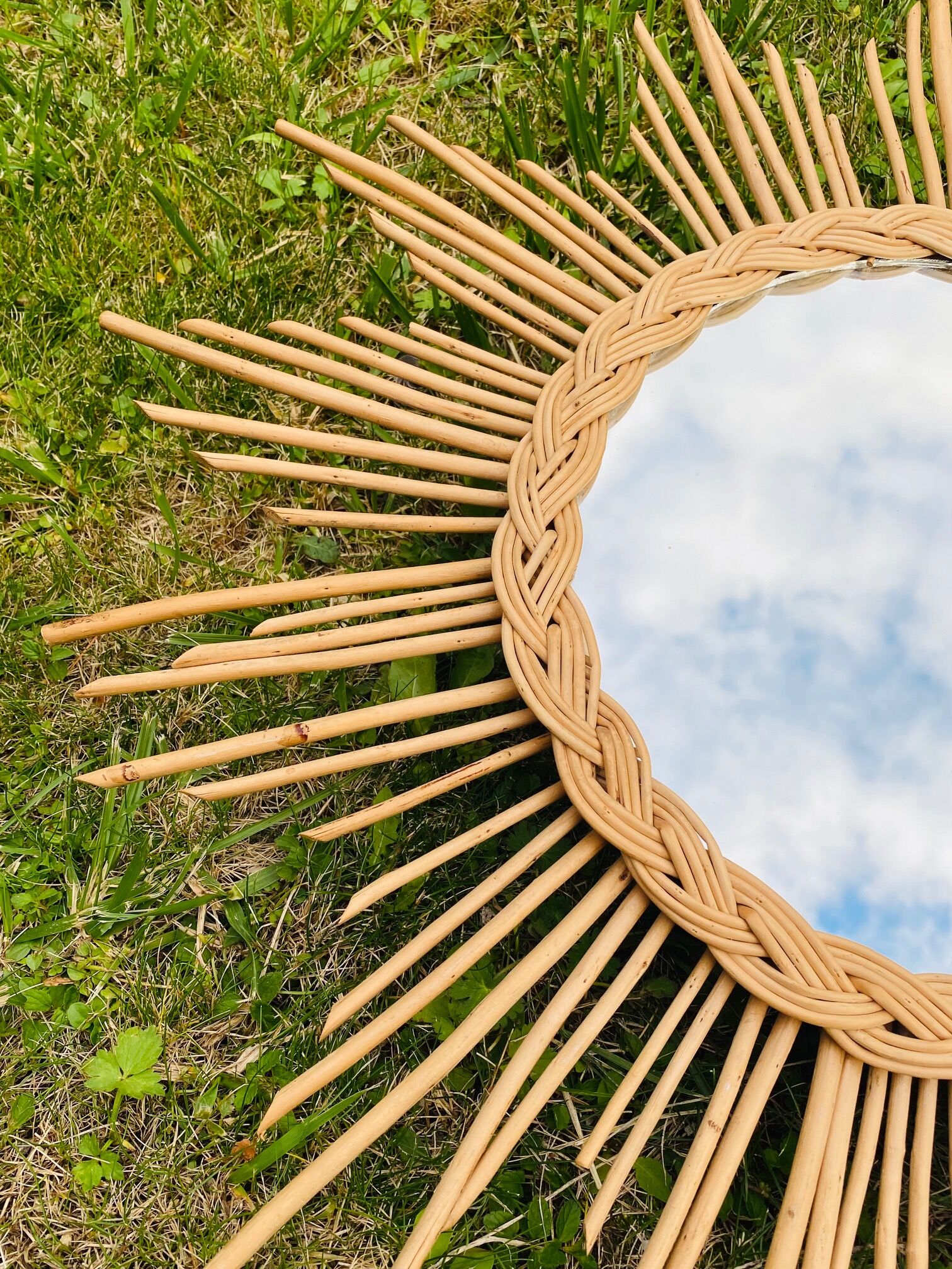 Vintage sun mirror in braided rattan and bamboo 60s/70s.