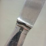 Serving cutlery in silver metal