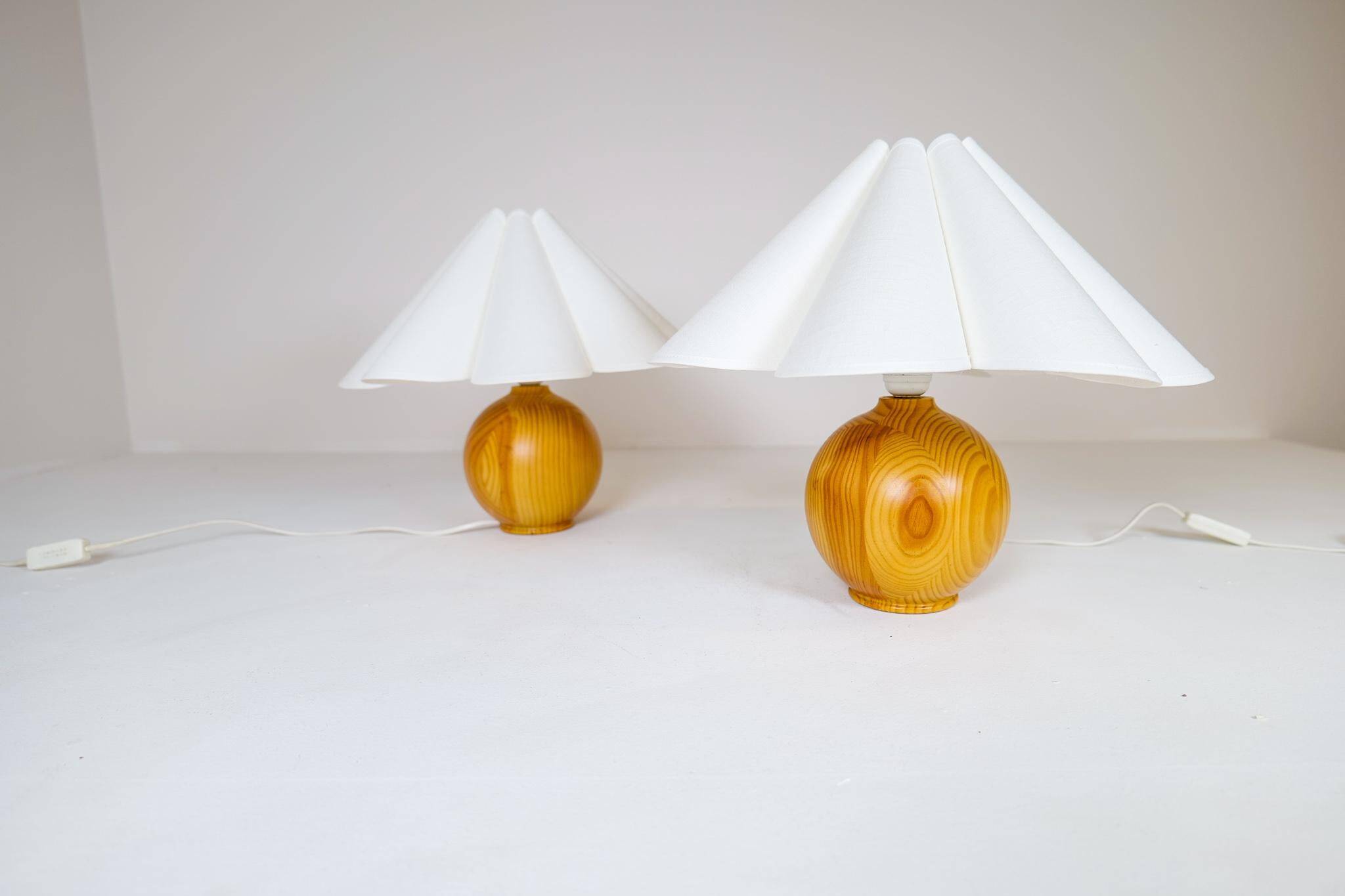 Sculptural modern table lamps from the mid-century in solid pine, Sweden, 1970s.
