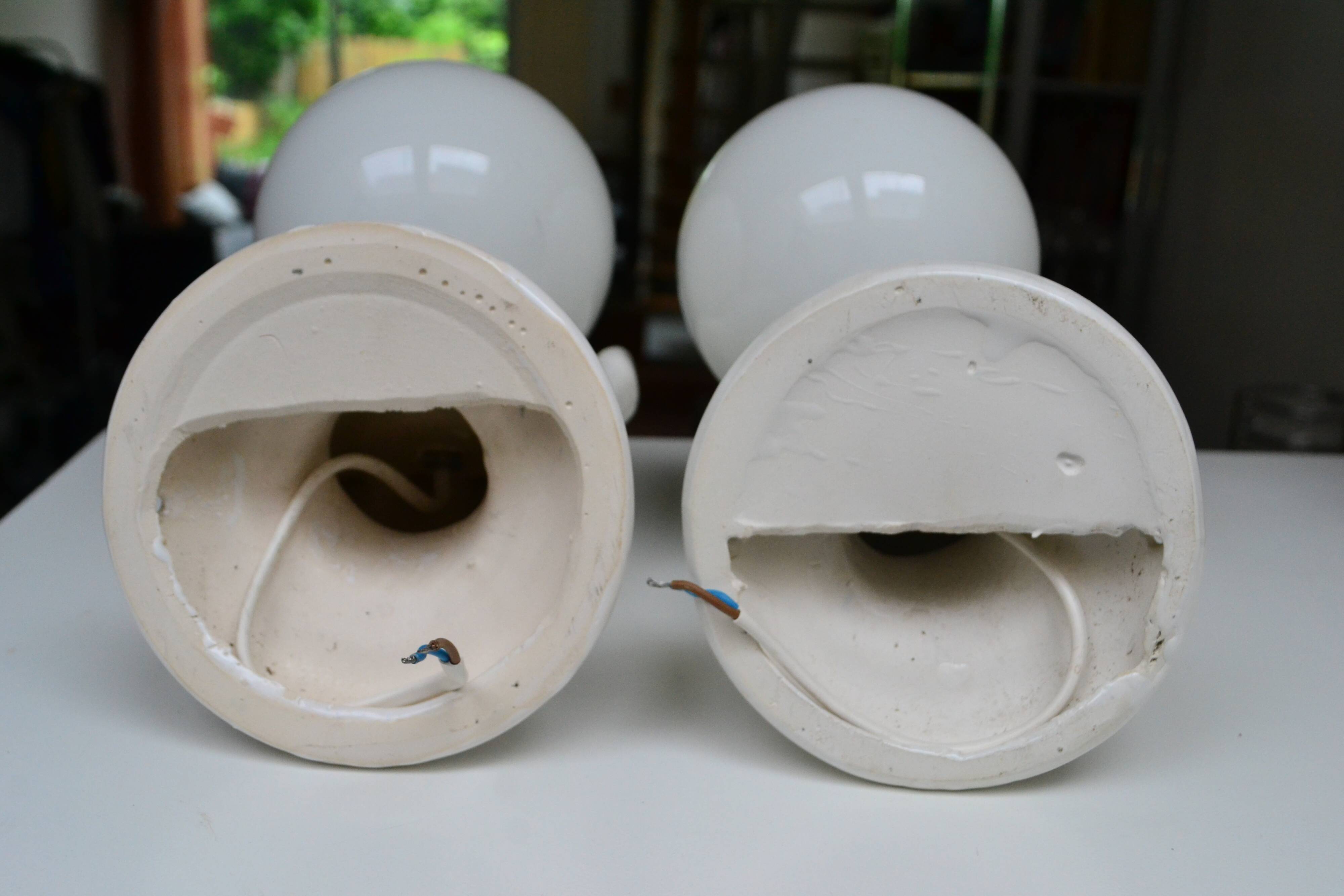 Pair of white ceramic wall lights from the 1970s.