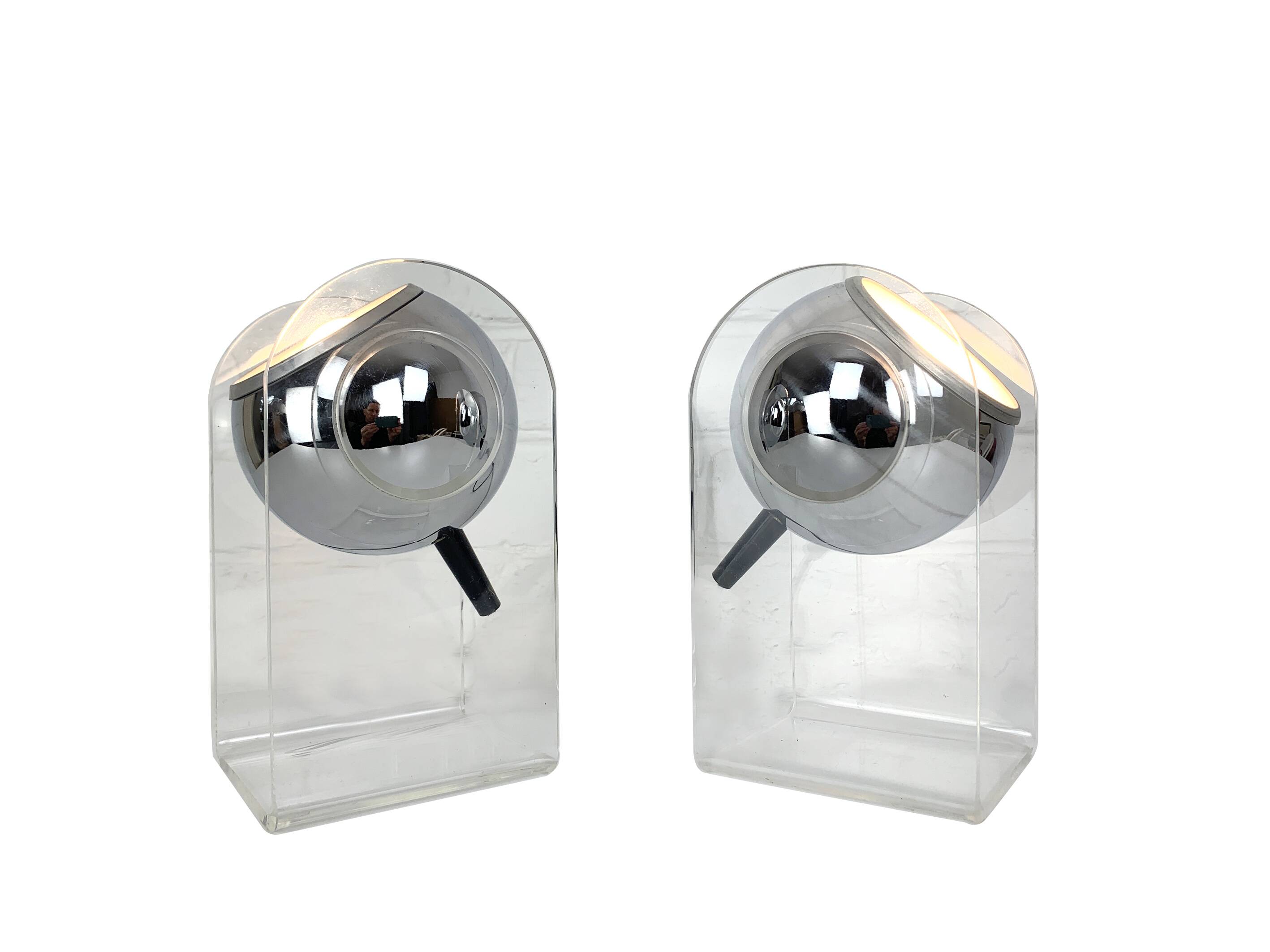 Pair of space age chrome plexiglass sphere table lamps from the 70s