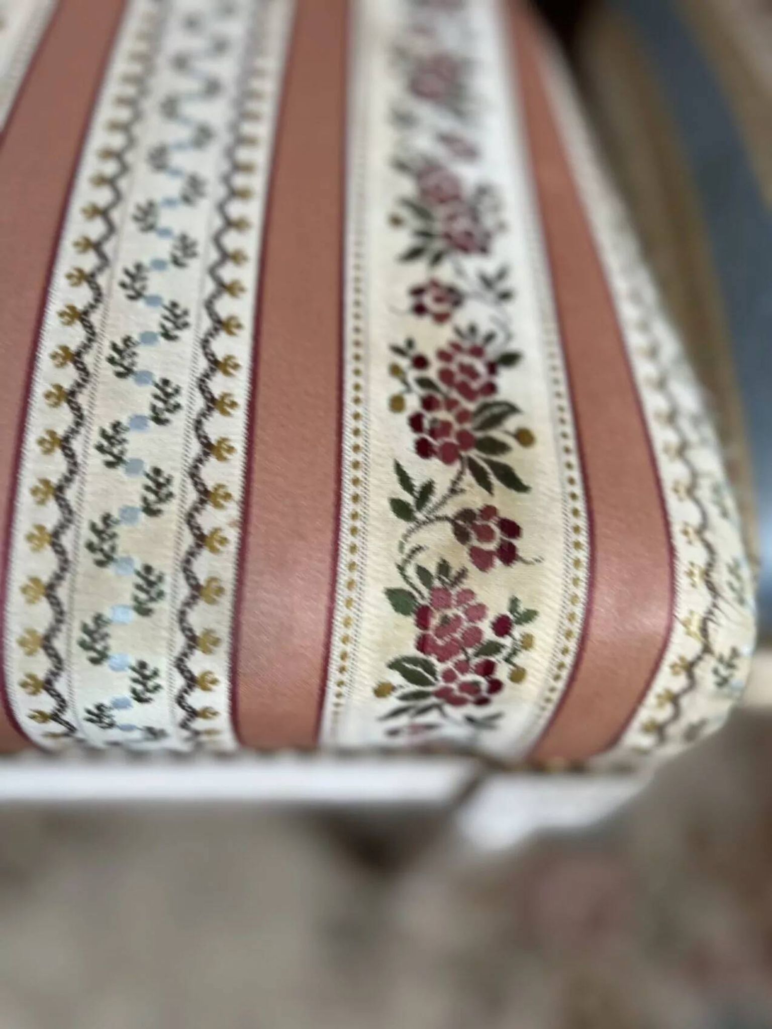 Pair of Louis XVI style chairs in painted wood and satin, classic elegance.