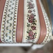 Pair of Louis XVI style chairs in painted wood and satin, classic elegance.