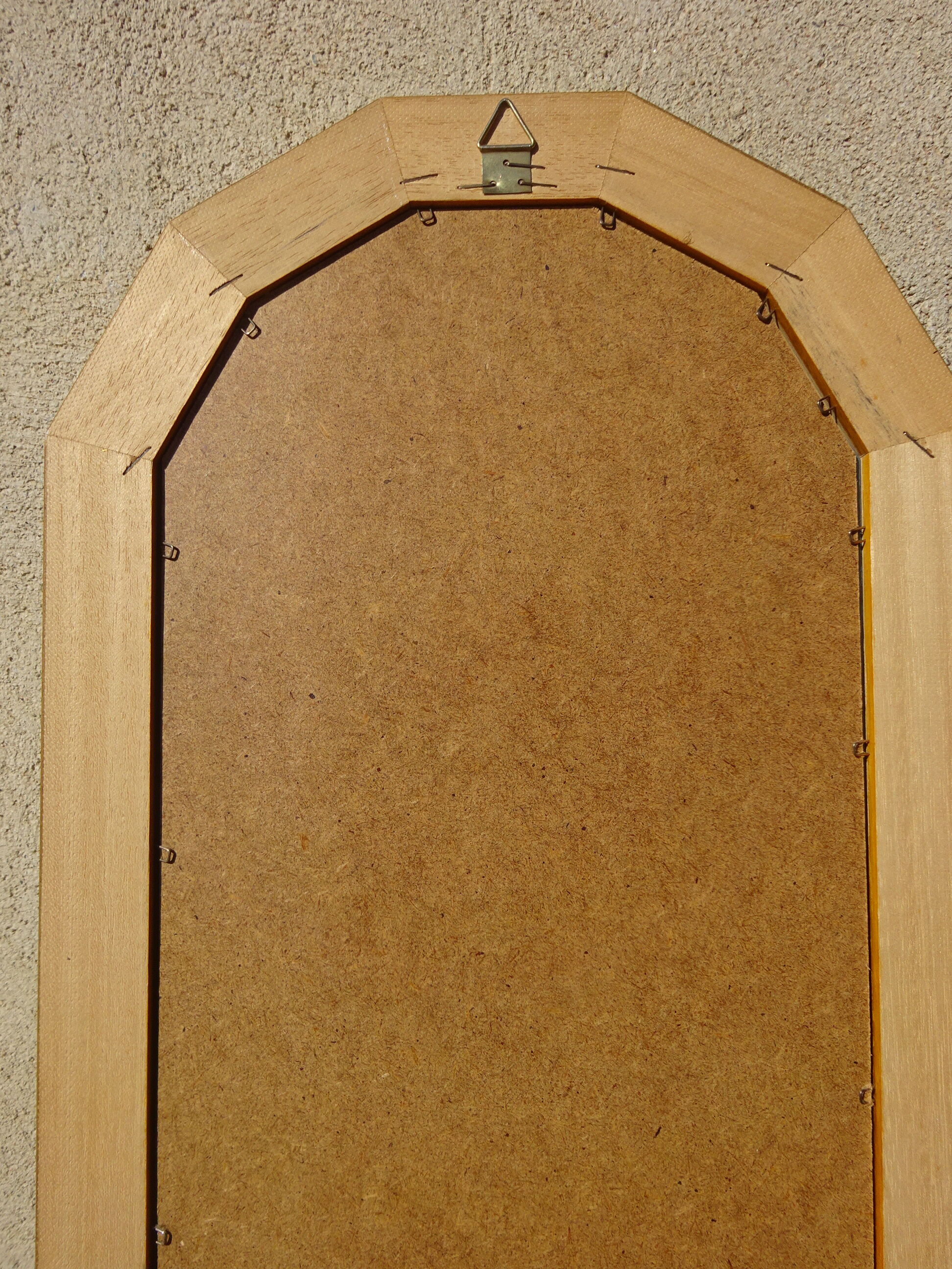 Vertical mirror, gold frame with beading.