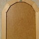 Vertical mirror, gold frame with beading.