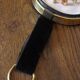 Vintage medallion domed glass dried flowers black gold