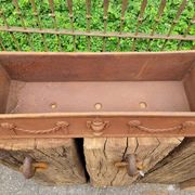 Rusty cast iron jardiniere planter