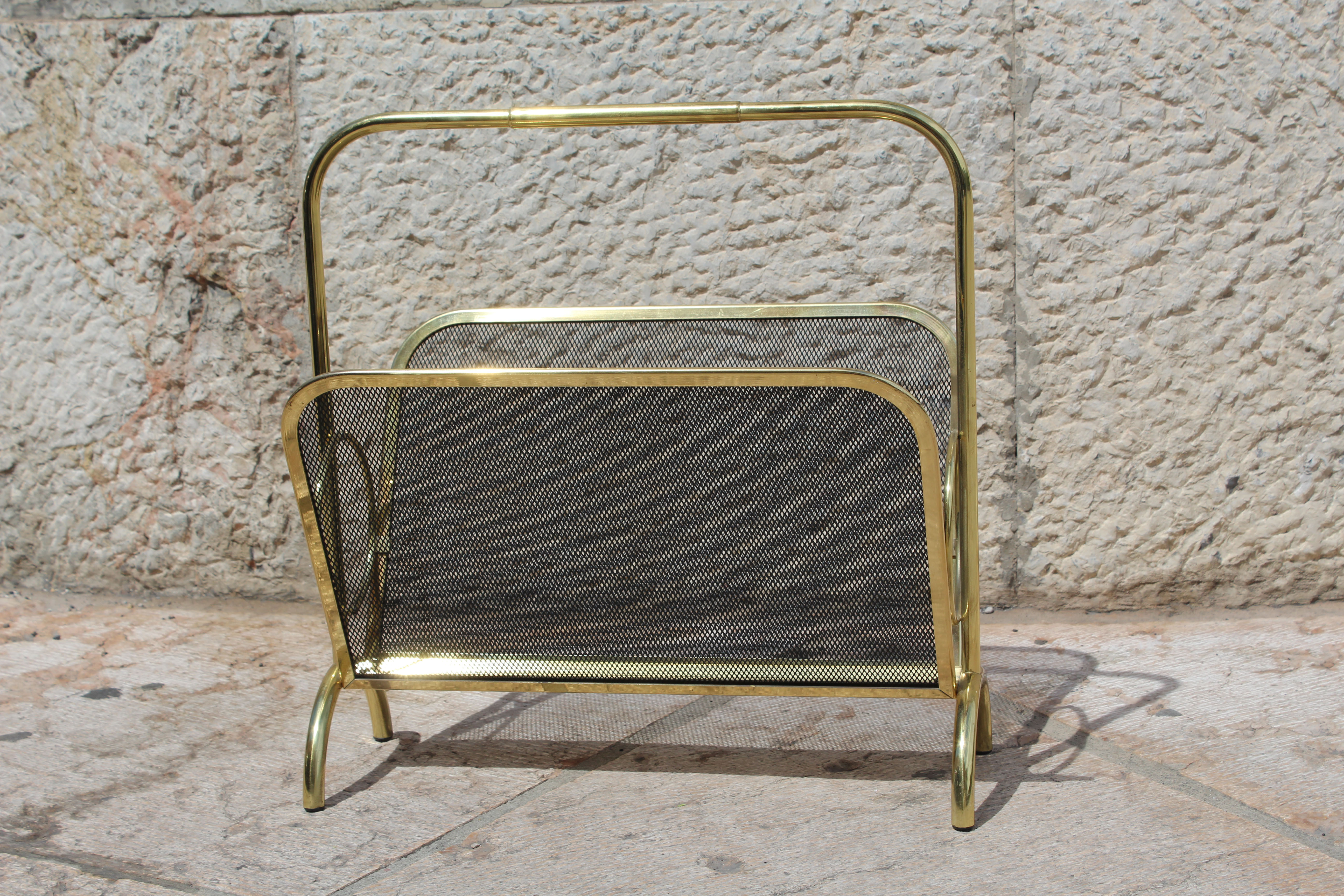 Magazine rack in brass and black lacquered metal, Italy 1970s