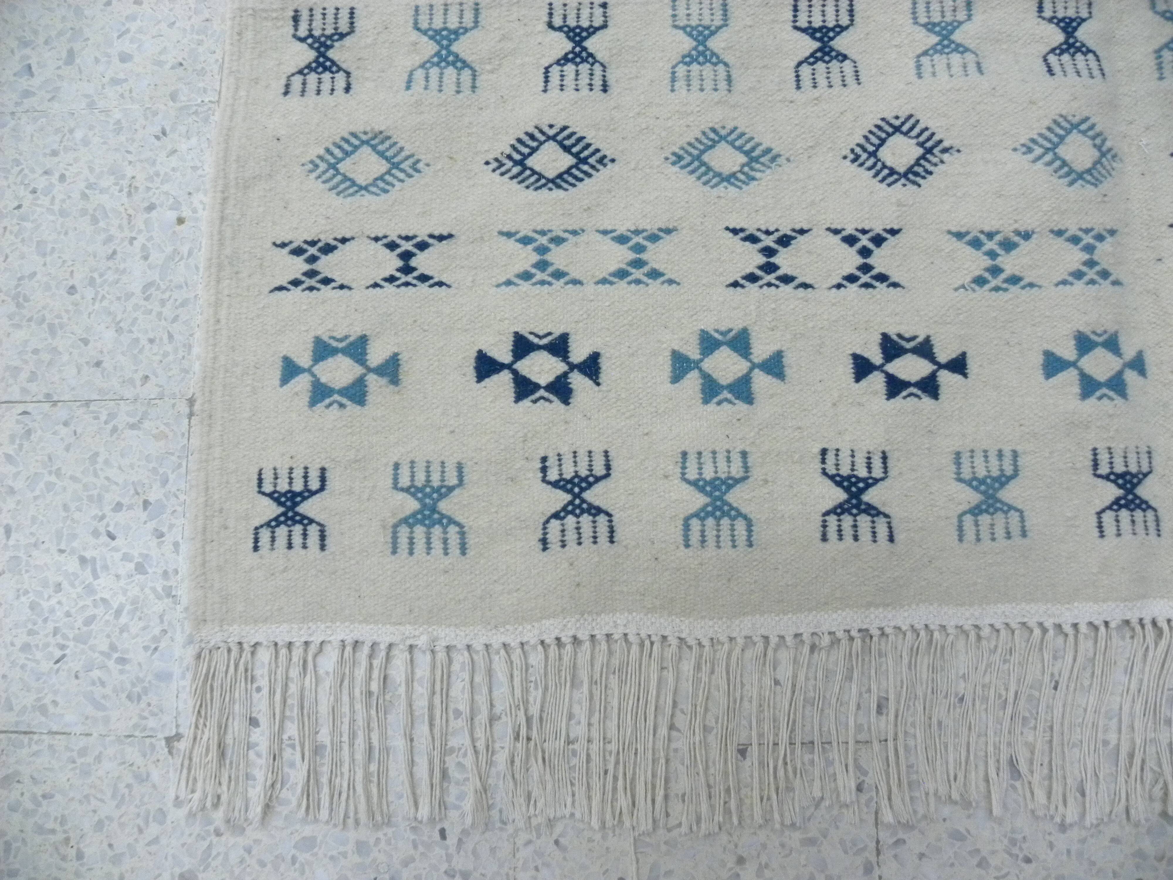 Nomadic Tunisian Berber rug, margoum kilim, ethnic in beige and blue wool.