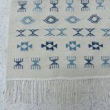 Nomadic Tunisian Berber rug, margoum kilim, ethnic in beige and blue wool.
