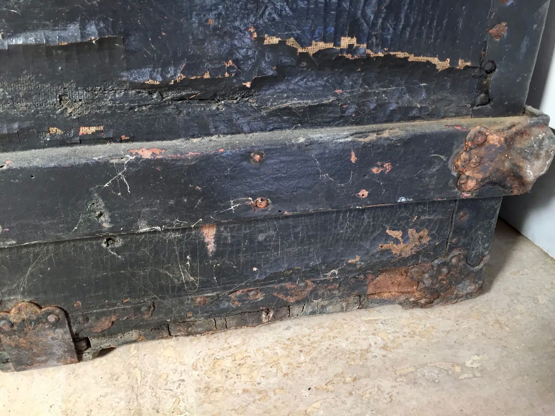 Black ancient travel trunk, 19th