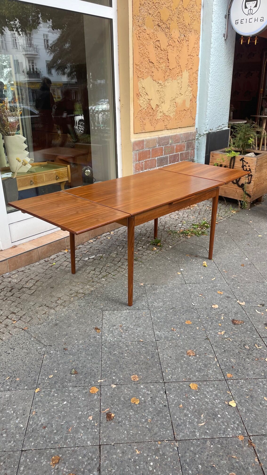 Vintage dining table from the 60s in extendable teak