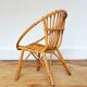 Children's shell armchair in rattan 1960s