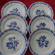 Lot de 6 assiettes plates en faience décor de roses.
