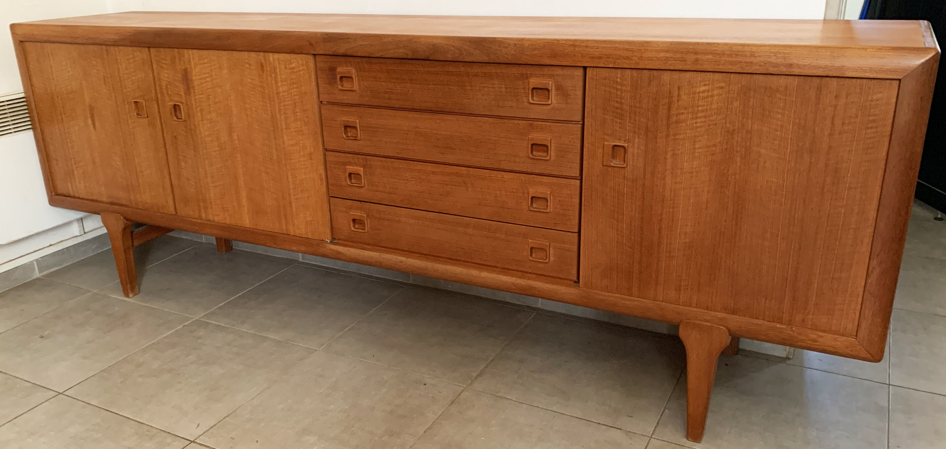 Large Danish vintage row in blond teak from the 60s