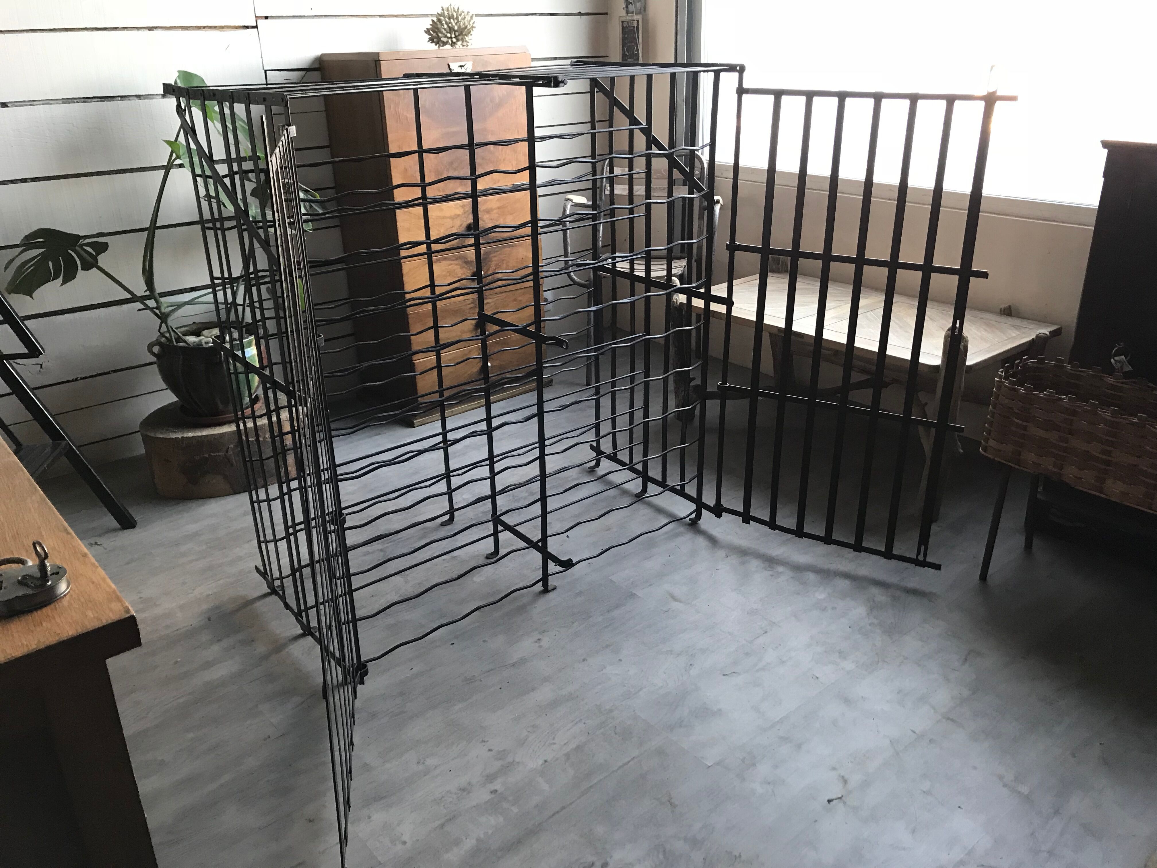 wine in metal cage wine cellar