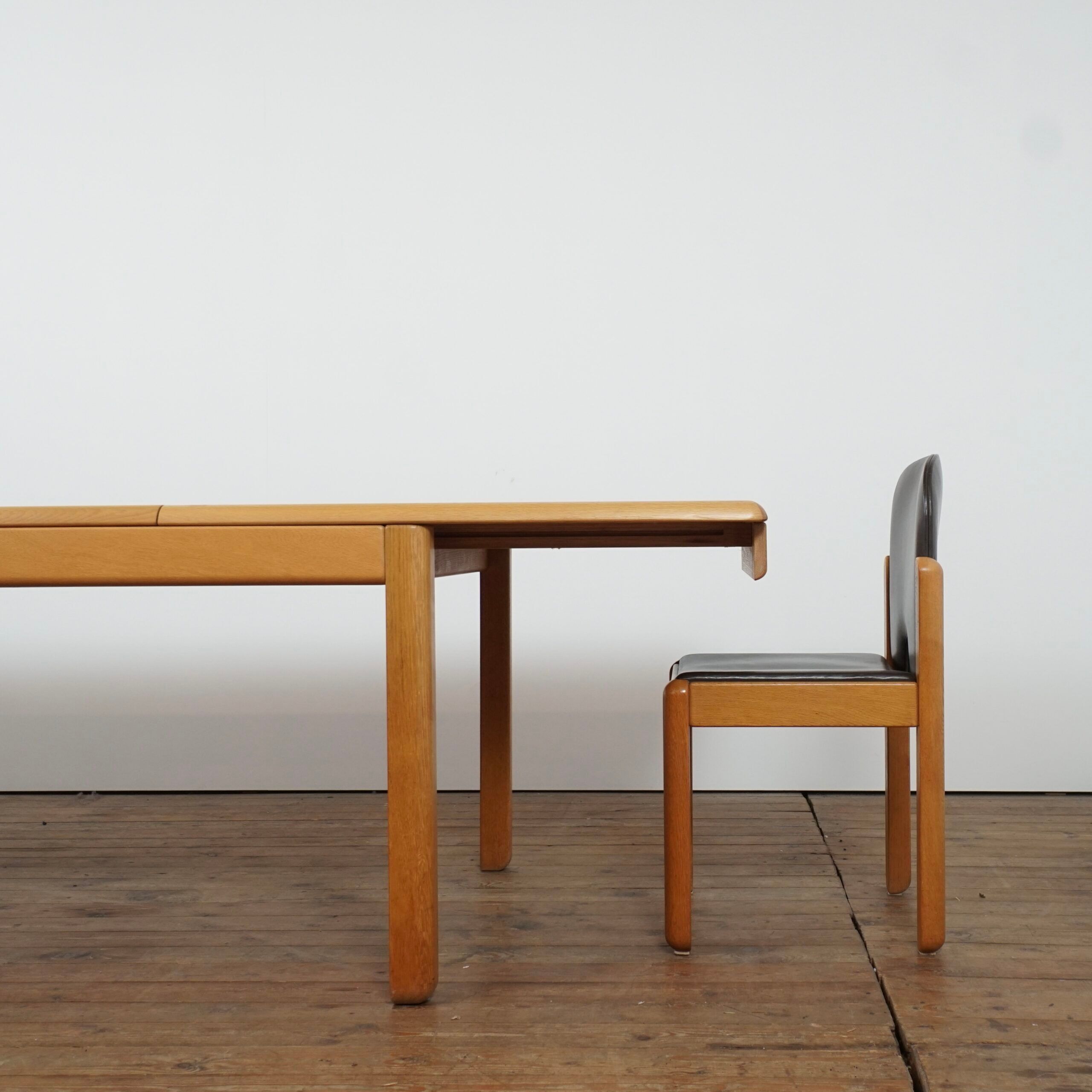Adjustable dining set in oak and leather chairs by Van Den Berghe Pauvers