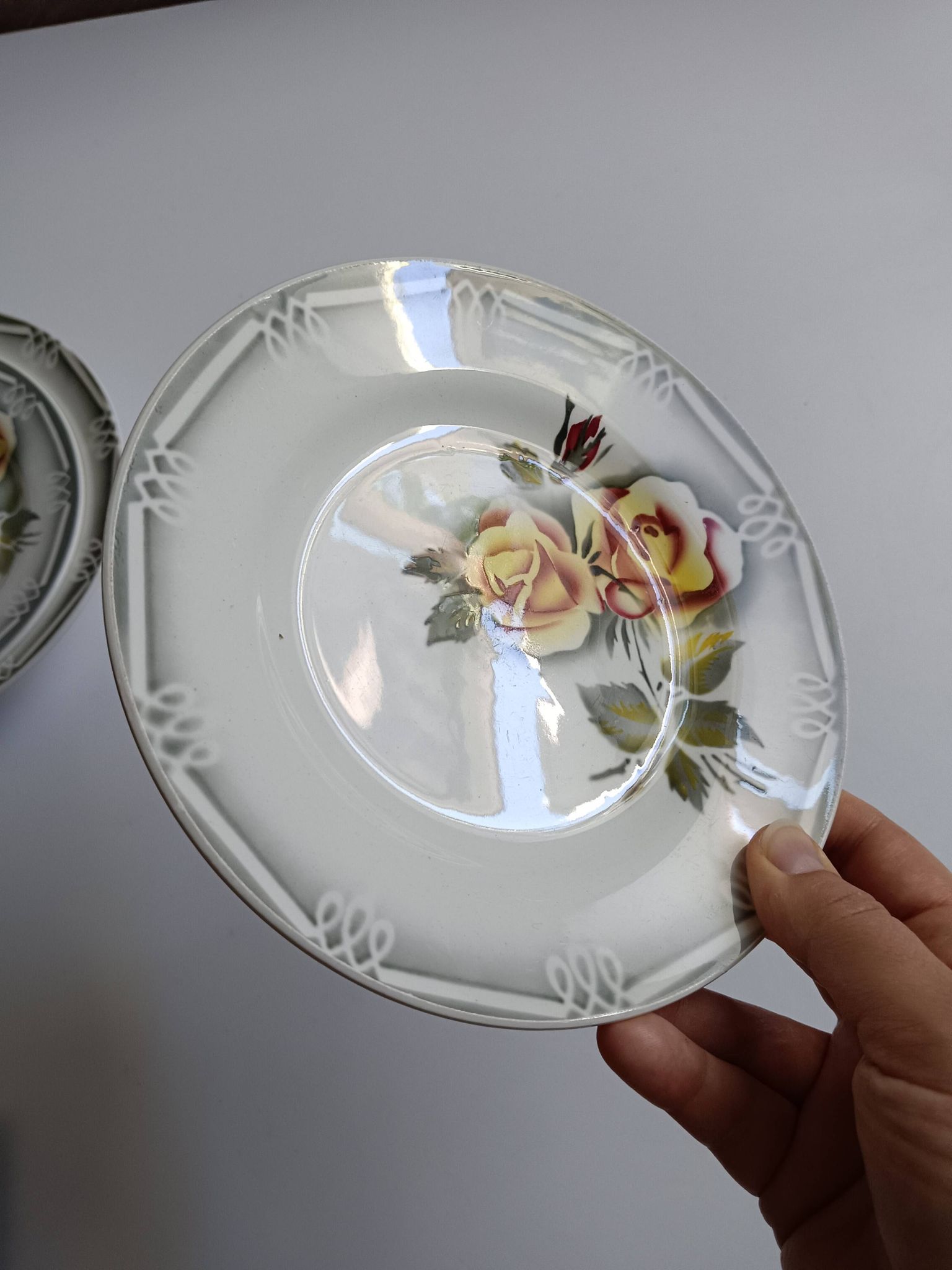 3 Digoin Sarreguemines Adèle plates in grey, yellow, and burgundy.