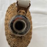 Lourdes pilgrimage bottle covered with wicker