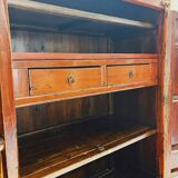 Antique red cabinet with brass details