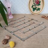 Stretchy silver metal flat bottom