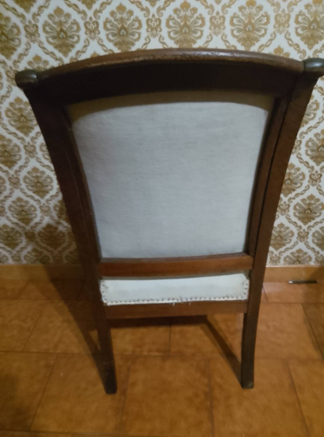 A pair of Empire period armchairs.