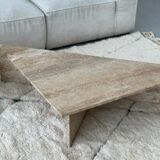 Pair of triangular travertine tables