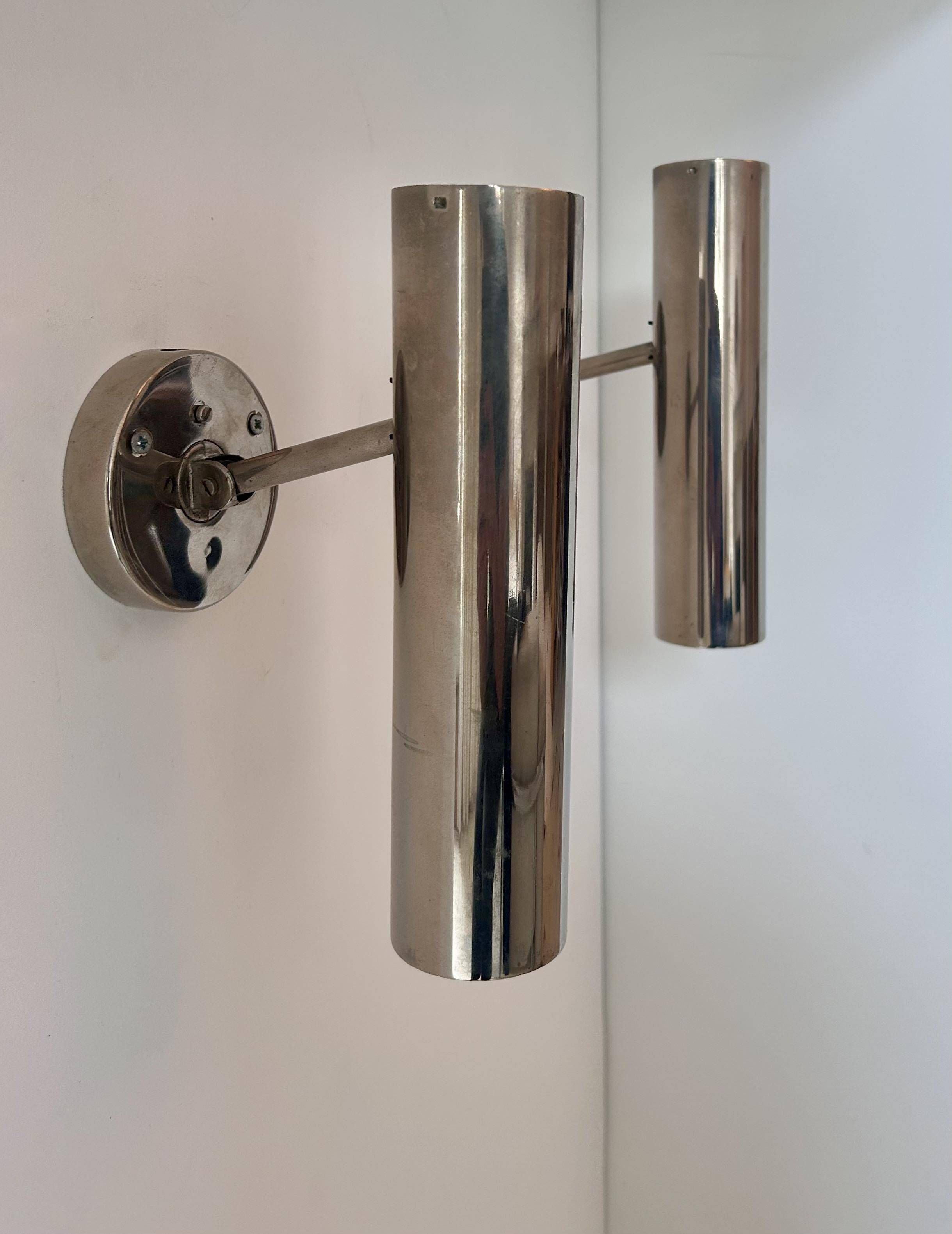 Pair of modernist adjustable wall lights, chrome metal, France 1960