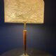 Elegant table lamp with a slender teak body on a tripod brass base, Germany, 1960s.