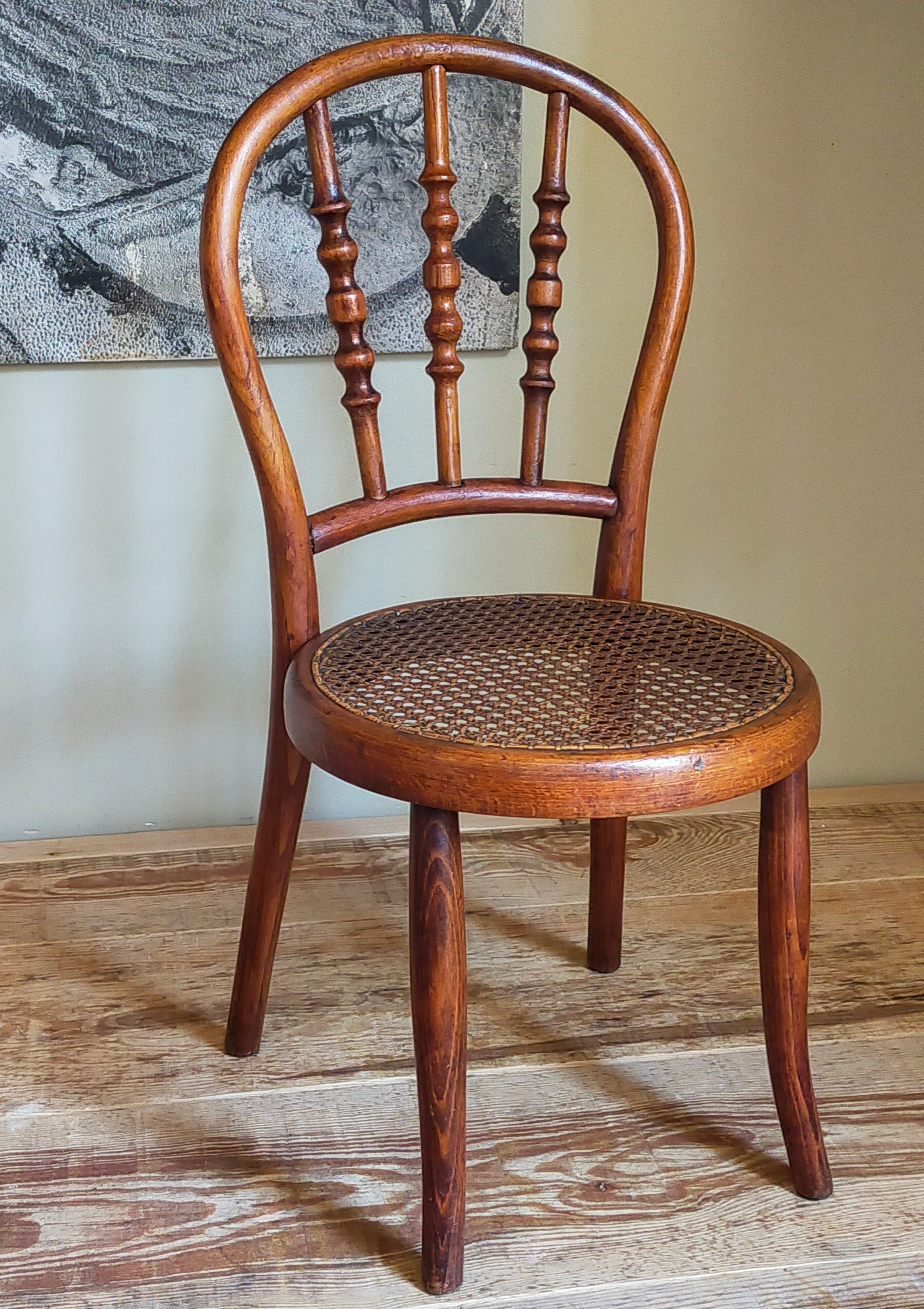 Children's chair in curved round wood old year