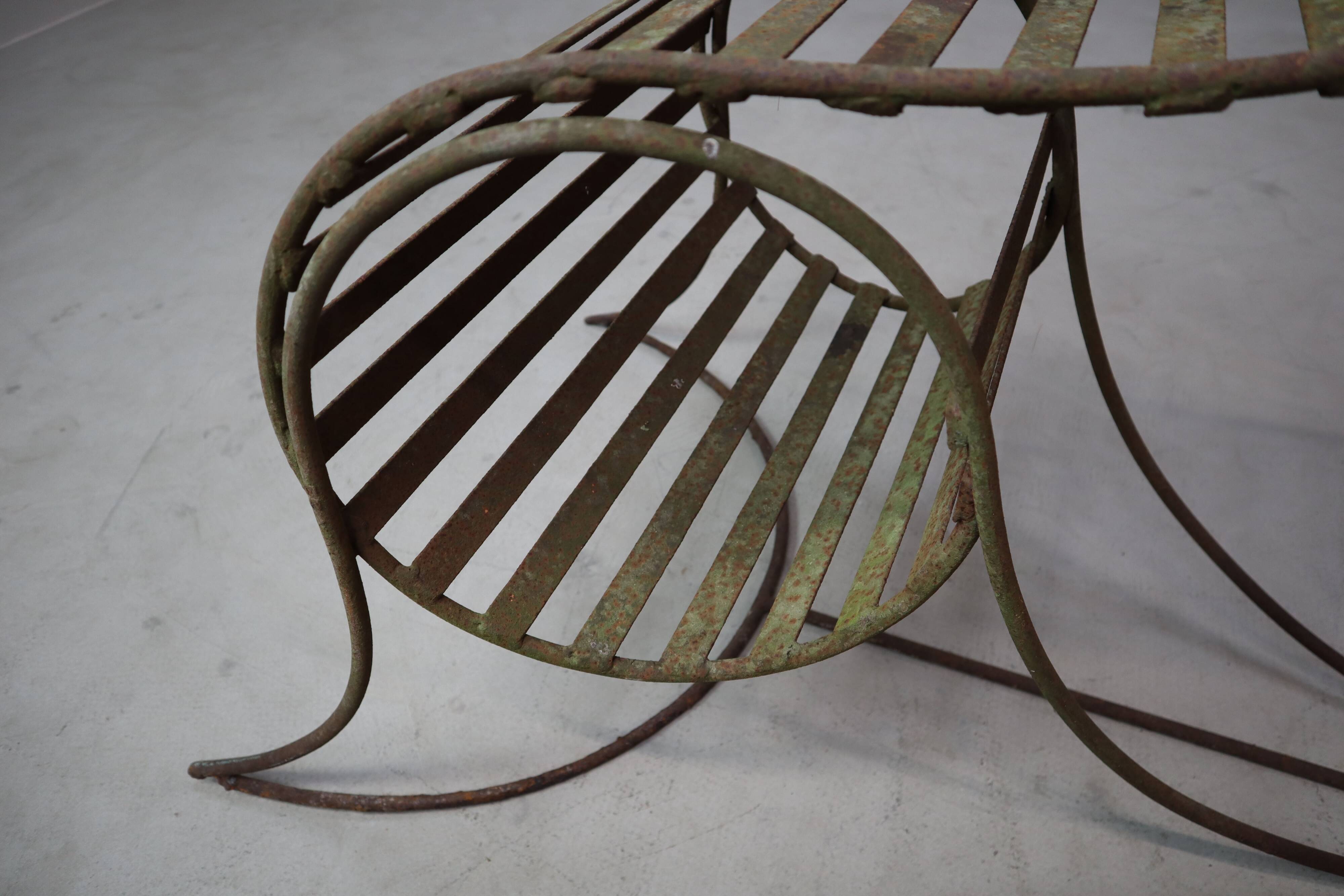 Set of three sculptural iron chairs