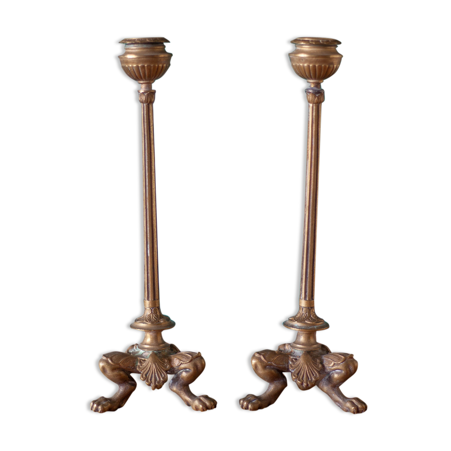 pair of numbered bronze candle holder