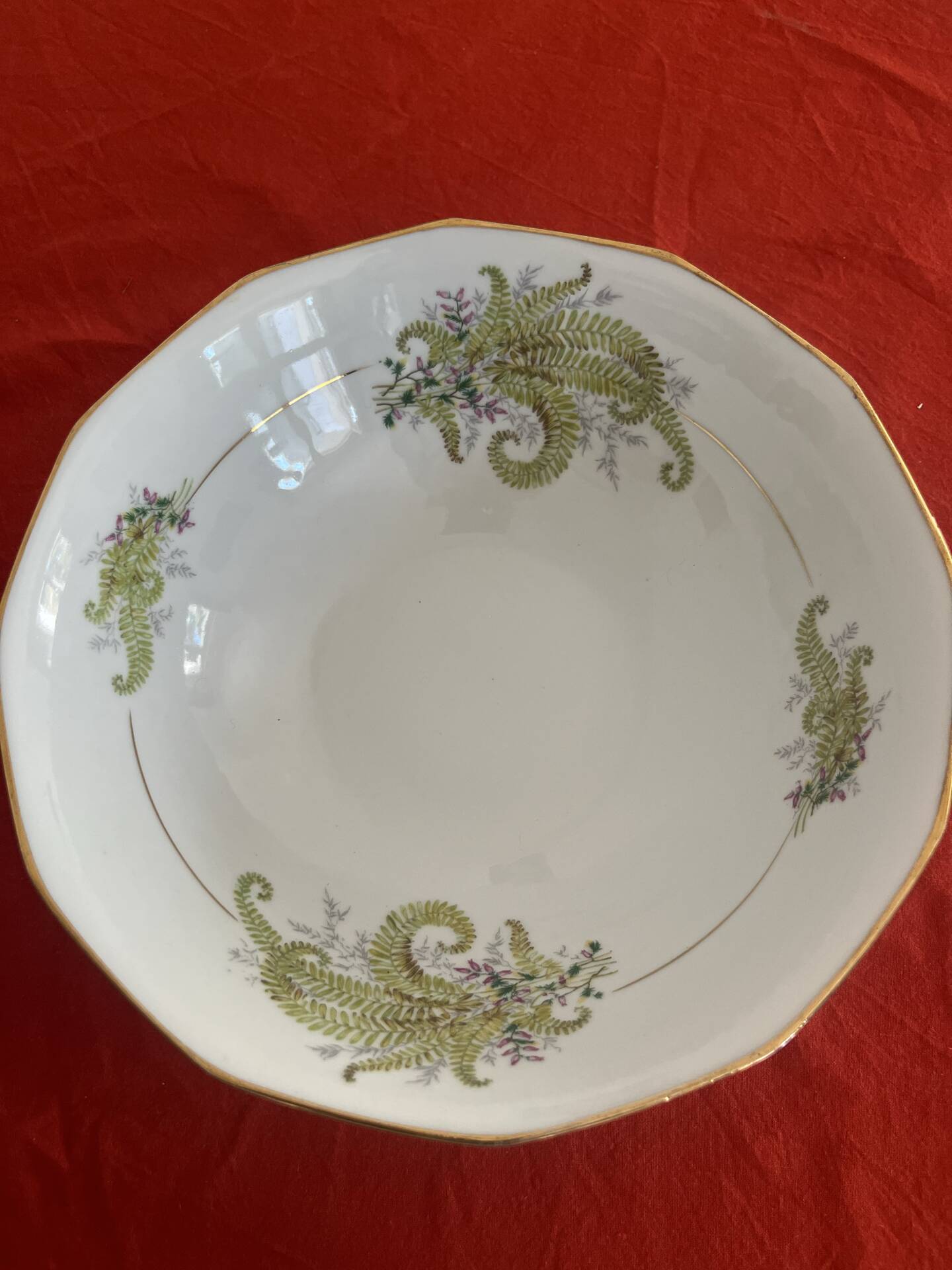 3 Limoges porcelain plates with a squirrel design.