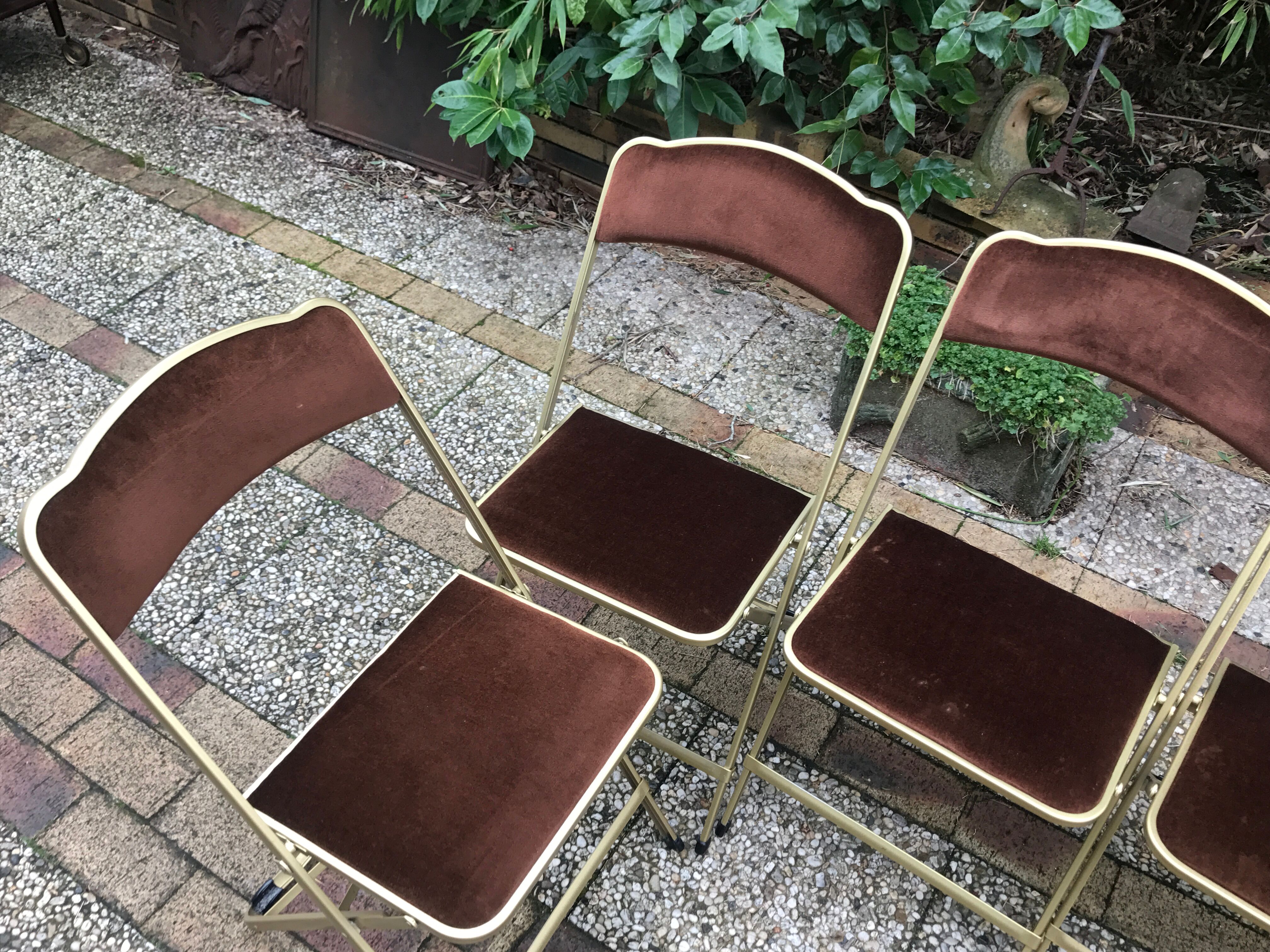 Six vintage folding chairs