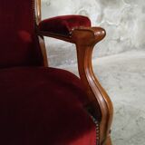 Walnut and velvet armchair
