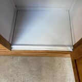 Display cabinet with hanging space