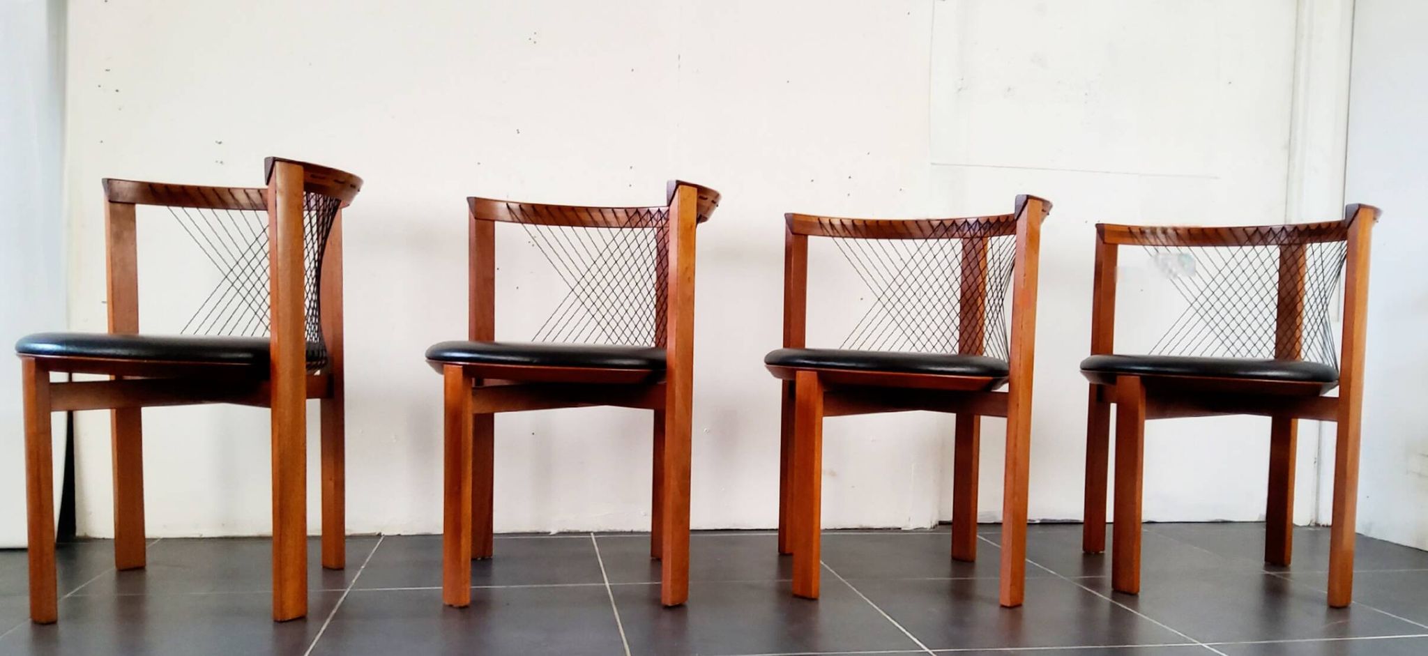 Niels Jorgen Haugesen String wood and leather chairs for Tranekaer, Denmark