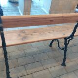 Antique garden bench with cast iron legs