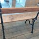 Antique garden bench with cast iron legs