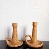 Pair of cork and terracotta candlesticks.