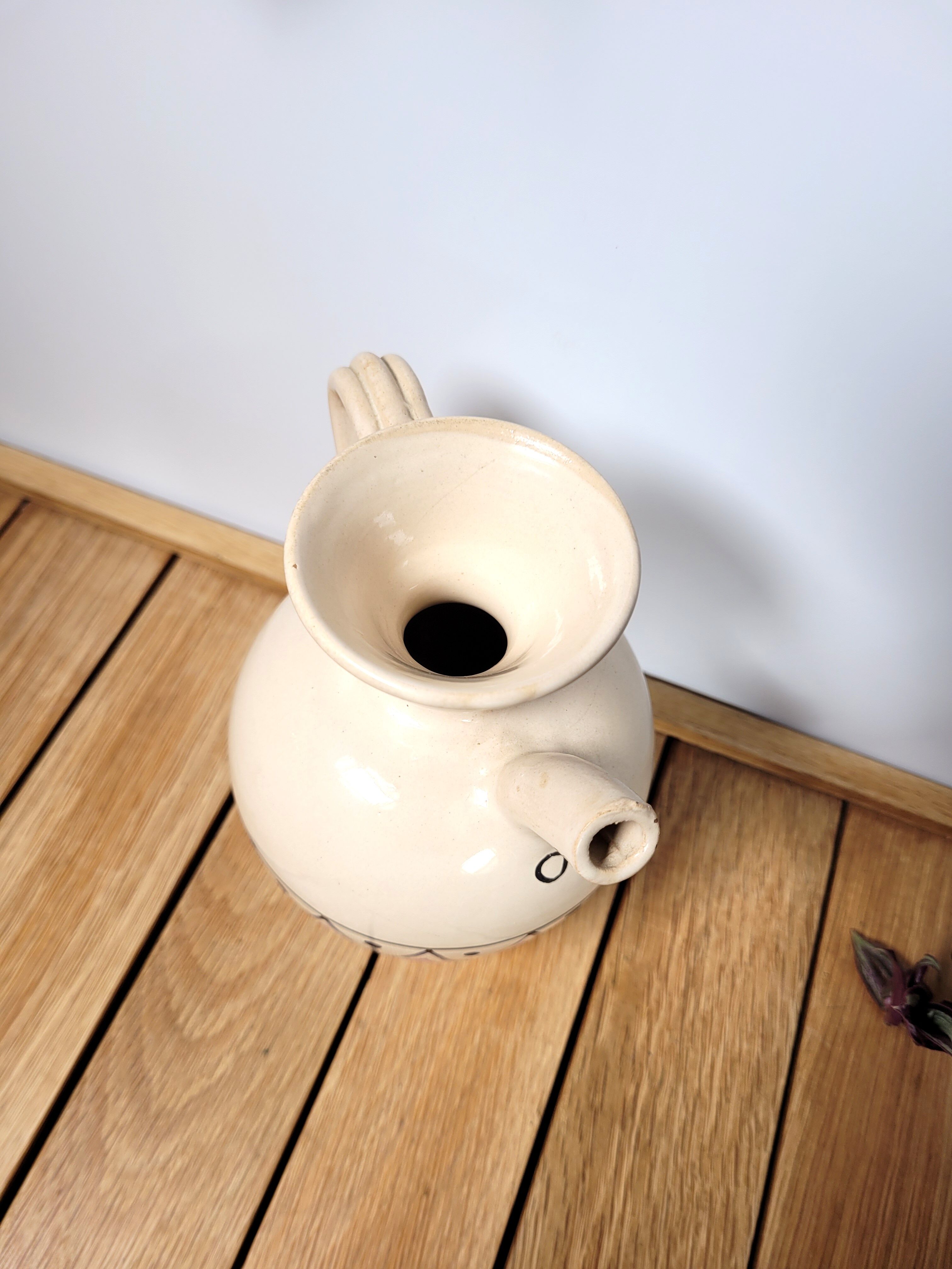 Ceramic pitcher decorated pottery