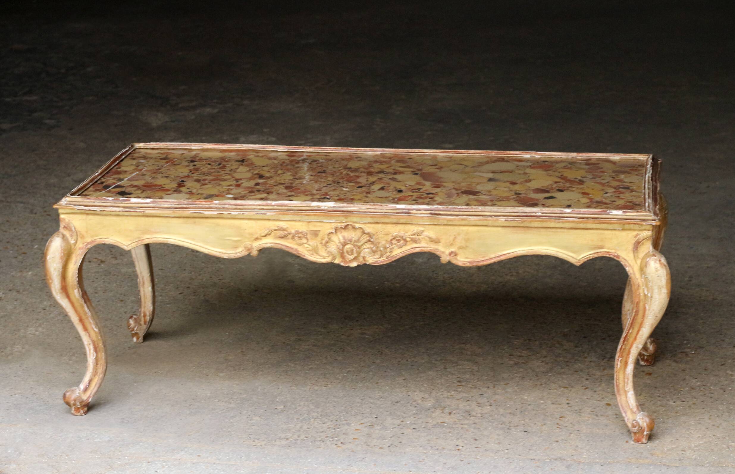 19th century coffee table. Gilded stucco and marble.