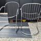 A pair of space age wire chairs