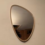 Asymmetrical free-form mirror from the 60s-70s