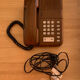 Old Thomson bakelite telephone and vintage wood